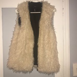 White fur vest
